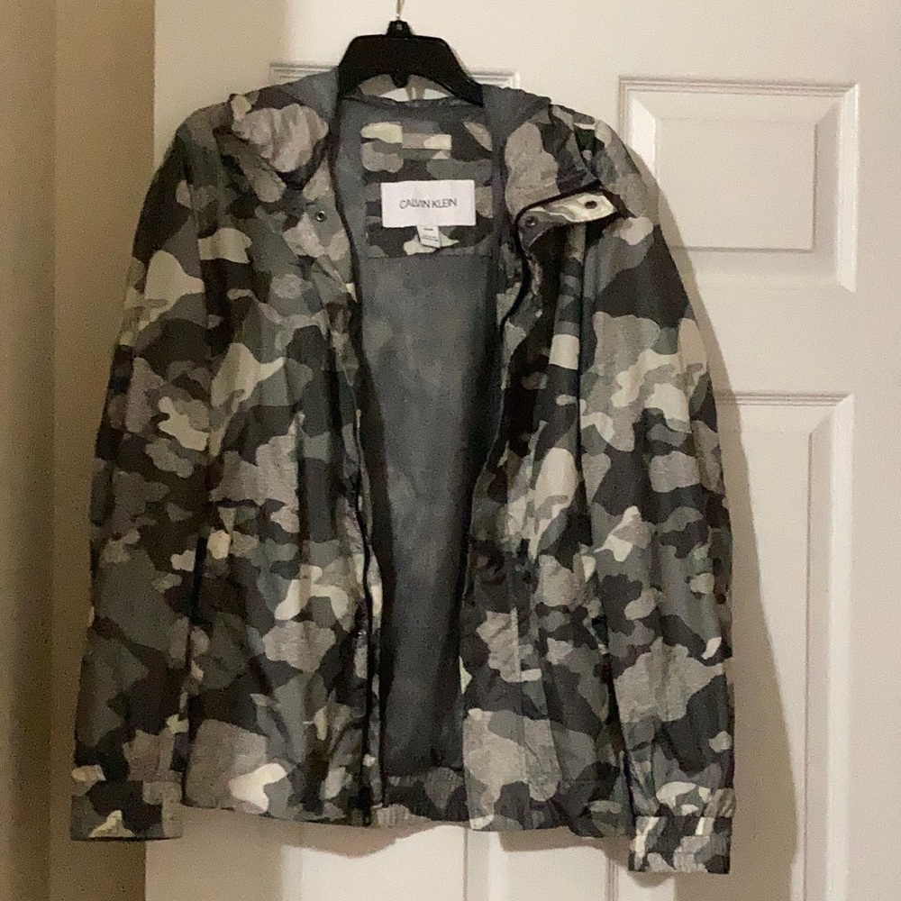 Calvin Klein Medium Rain jacket. Never worn.